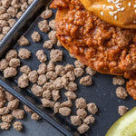 Close up image of Freeze-Dried Beef Crumbles in a sandwich and on a plate.